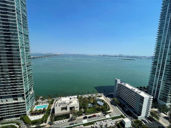 AMAZING VIEWS from this fabulous Corner unit 3 Beds / 3 Baths at Gran Paraiso most magnifi