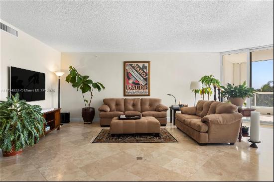 Discover luxury living in this spacious 2-bedroom + den/office, easily convertible into a 