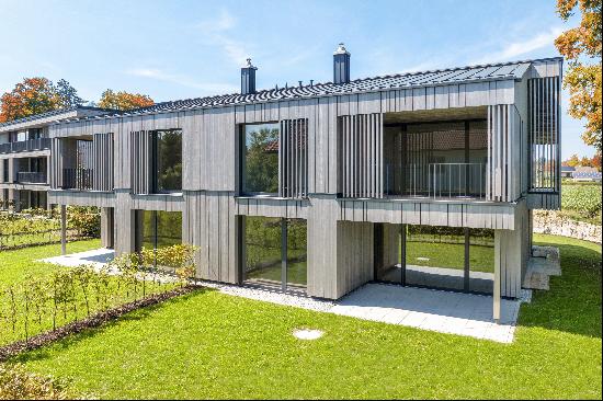 Ready-to-occupy new build: sustainable villa half with elegant design furnishings