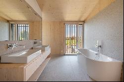 Ready-to-occupy new build: sustainable villa half with elegant design furnishings