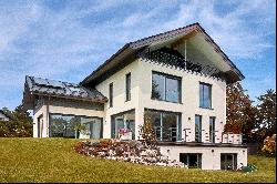 High-class family home from 2022 with granny apartment and stunning views of the Alps