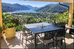 Lugano-Neggio: elegant villa for sale, offering a magnificent open view of Lake Lugano & 