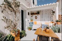 Two-storey Menorcan house with a charming terrace for sale in Mahón.