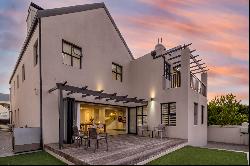 Modern and Sophisticated in sought after gated estate