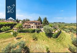 Elegant renovated villa surrounded by olive trees for sale on the outskirts of Florence