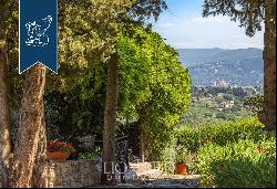 Elegant renovated villa surrounded by olive trees for sale on the outskirts of Florence