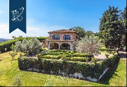 Elegant renovated villa surrounded by olive trees for sale on the outskirts of Florence