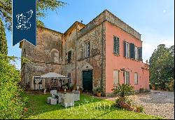 Elegant historical villa with a private park for sale in the heart of Tuscany