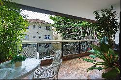 Apartment with balcony, security, and leisure facilities on a quiet street