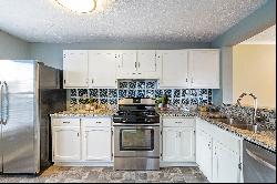 Beautifully Updated Two Bedroom Condominium Nestled in a Serene Community