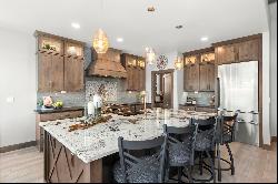 Beautiful Custom Home located in the gated Rookery section of Heron Lakes/TPC 