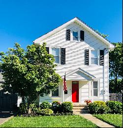 Pristine charming colonial has an abundance of windows with natural light.