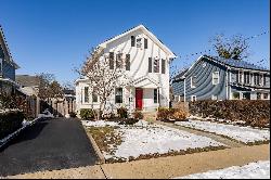 Pristine charming colonial has an abundance of windows with natural light.