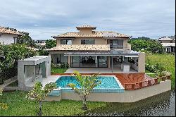 Contemporary house in a gated community with lake view and full amenities