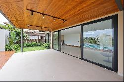 Contemporary house in a gated community with lake view and full amenities