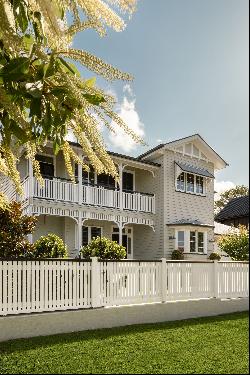 Timeless Charm Meets Modern Elegance: Iconic Queenslander in a Premier Enclave