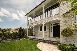 Timeless Charm Meets Modern Elegance: Iconic Queenslander in a Premier Enclave