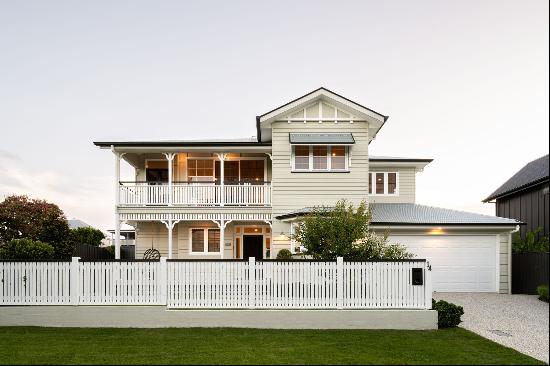 Timeless Charm Meets Modern Elegance: Iconic Queenslander in a Premier Enclave