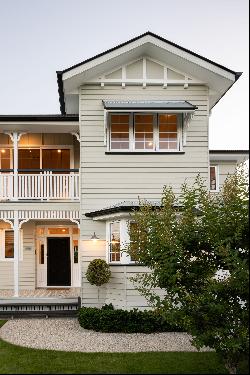 Timeless Charm Meets Modern Elegance: Iconic Queenslander in a Premier Enclave