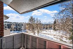 Charming Top-Floor Condo with Great Mountain Views