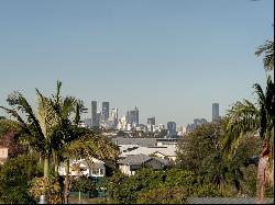 Timeless Queenslander Elegance with City Views and Family Living at its Finest