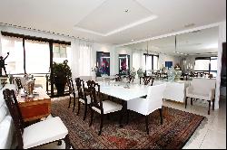 Exclusive renovated apartment with a circular layout and glass-enclosed balcony