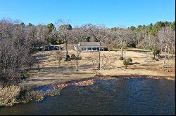 SECLUDED WATERFRONT HOME ON PRIVATE FISHING LAKE IN EAST TX!