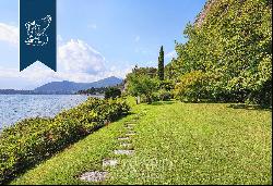 Unique property in the town of Griante for sale with a private dockyard and beach