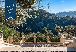 Timeless elegance not far from Rome: Italian-style garden and olive grove for sale 