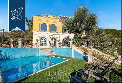 Timeless elegance not far from Rome: Italian-style garden and olive grove for sale 