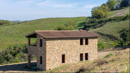 Giotto country house with loggia and garden near Montalcino, Siena