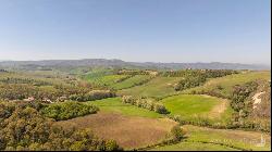 Giotto country house with loggia and garden near Montalcino, Siena