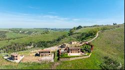 Giotto country house with loggia and garden near Montalcino, Siena