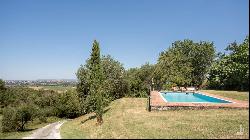 Seventeenth-century casale with pool for sale in Cortona – Tuscany 