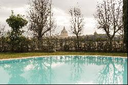 Apartment with garden and communal swimming pool