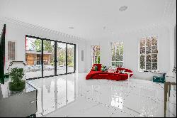 Stunning family home with private swimming pool for sale in Oxshott