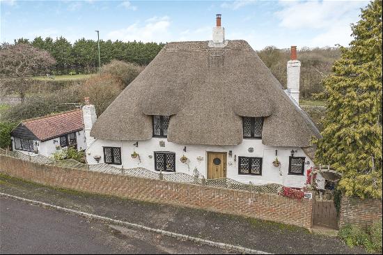 Historic Grade II cottage in Nutbourne-steeped in charm, moments from the shore.