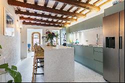 Historic luxury townhouse with roof terrace for sale in Sitges.