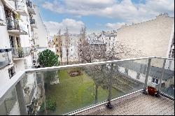 Paris 10th District – A 4-room apartment with a balcony