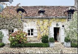 Idyllic farmhouse with outbuildings in the Loire valley with 4 hectares of land