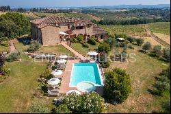 Enchanting Farm Amidst the Rolling Tuscan Hills