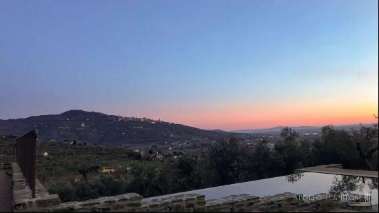 Villa La Cascata with swimming pool and olive grove in Cortona, Arezzo