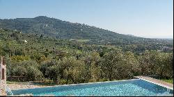 Villa La Cascata with swimming pool and olive grove in Cortona, Arezzo