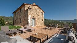 Villa La Cascata with swimming pool and olive grove in Cortona, Arezzo