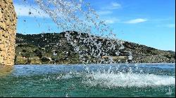 Villa La Cascata with swimming pool and olive grove in Cortona, Arezzo