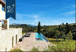 Contemporary luxury farmhouse surrounded by the quiet Tuscan countryside for sale