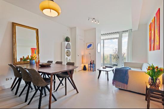 Bright and Stylish Apartment with Spacious Balcony and Stunning View over Wester