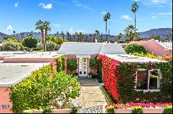 Classic Hollywood Regency-style home with sweeping  mountain & golf course views