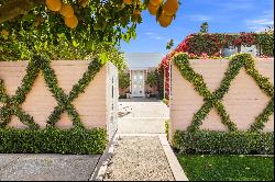 Classic Hollywood Regency-style home with sweeping  mountain & golf course views