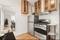 Charming Elmwood Condominium Steps from College Avenue